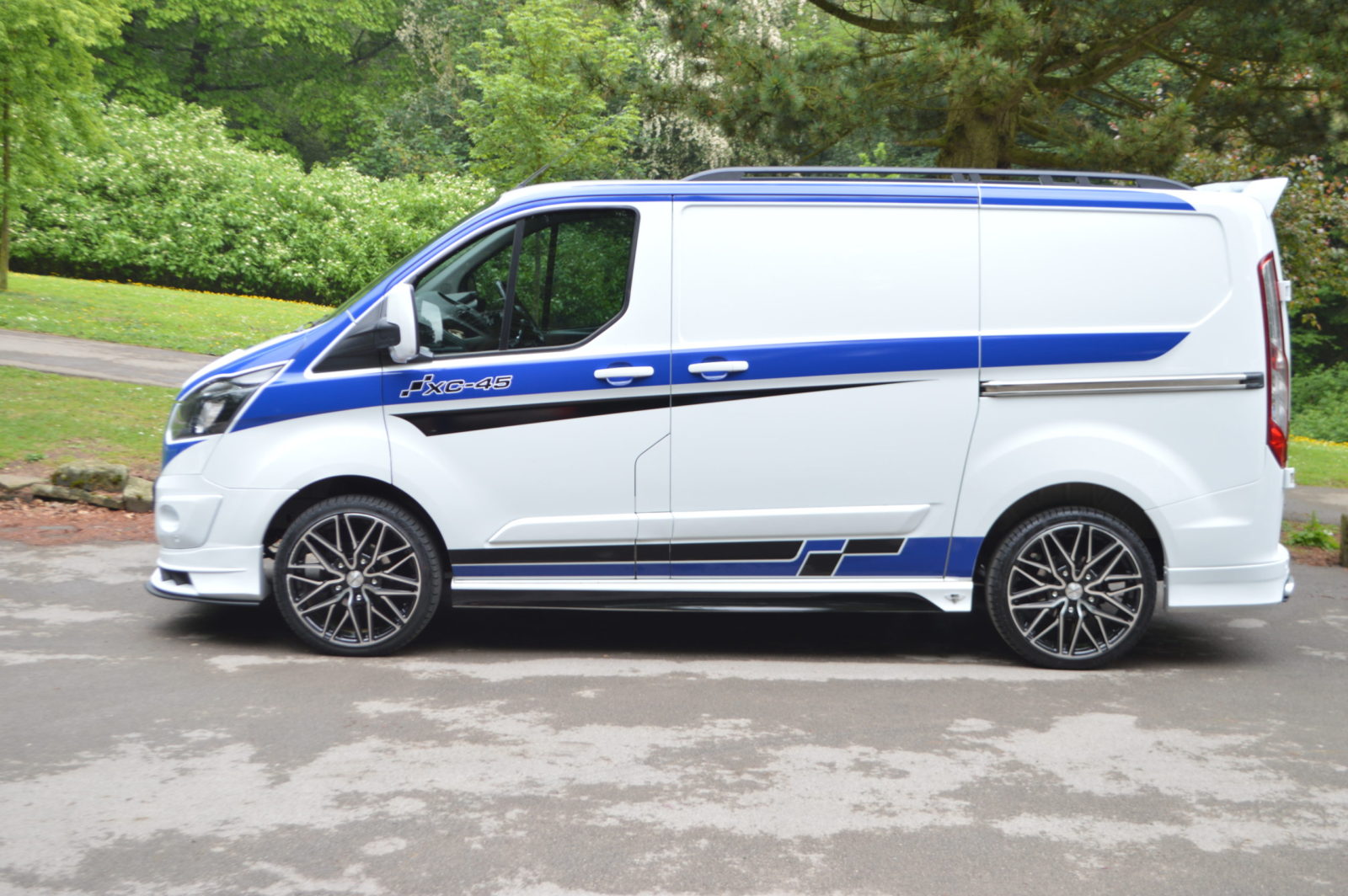 A van with our Side skirts fitted onto it.