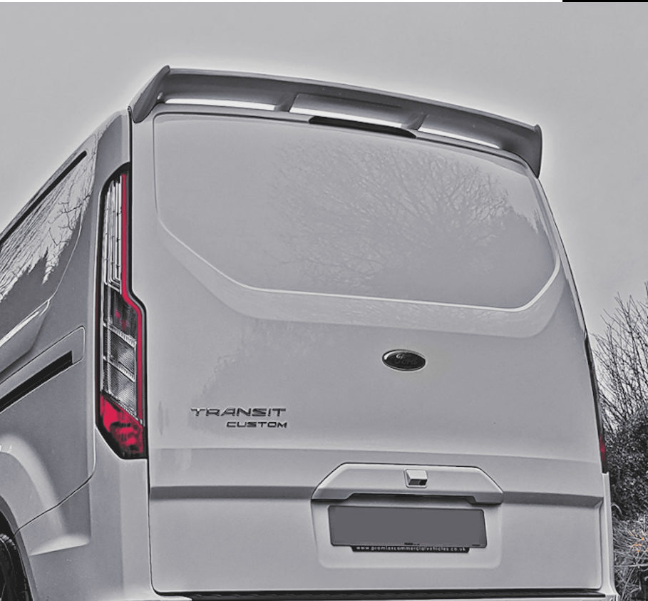 A white Ford Transit Custom with a Tailgate spoiler attached