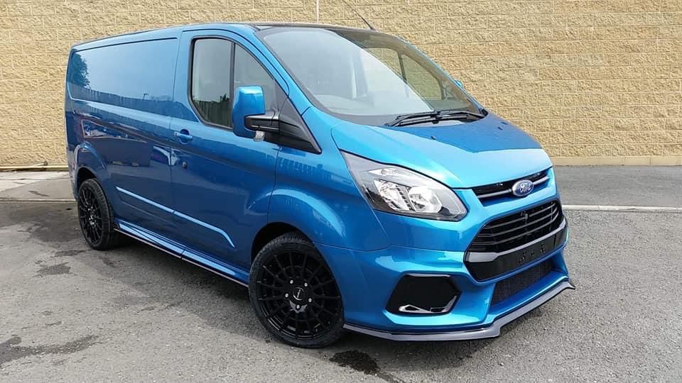 A Blue Ford Transit Custom with our Full VS Front Bumper attached.