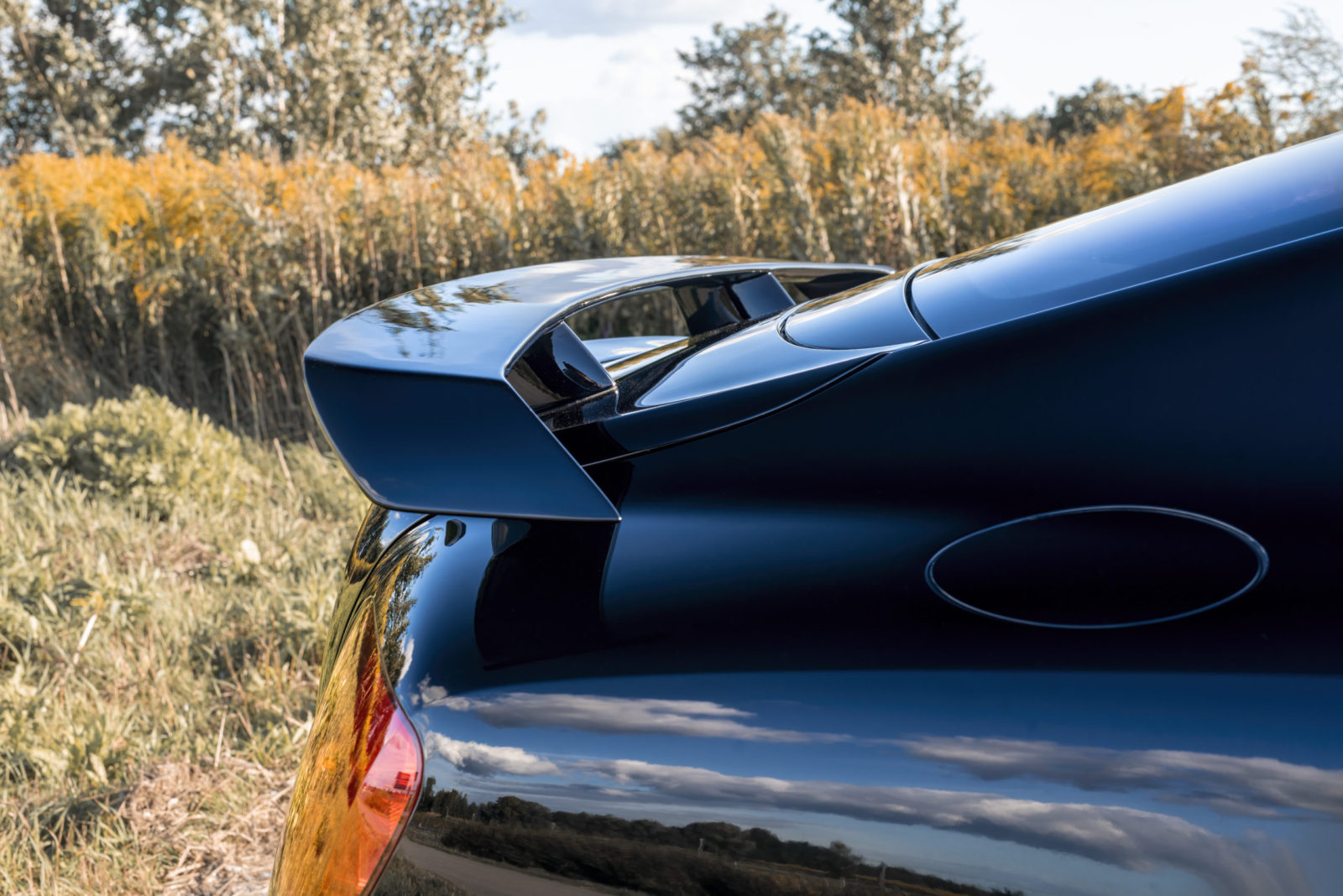 A Side photo of the Bentley GTC Spoiler