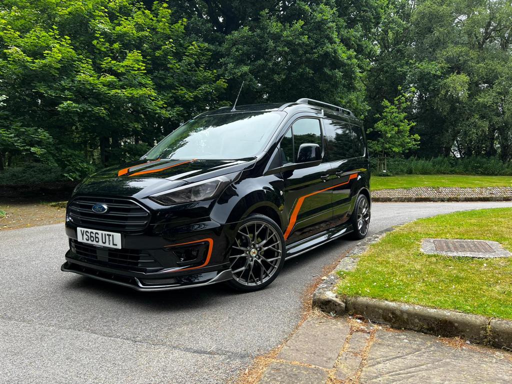 Black and Orange Ford Transit Connect